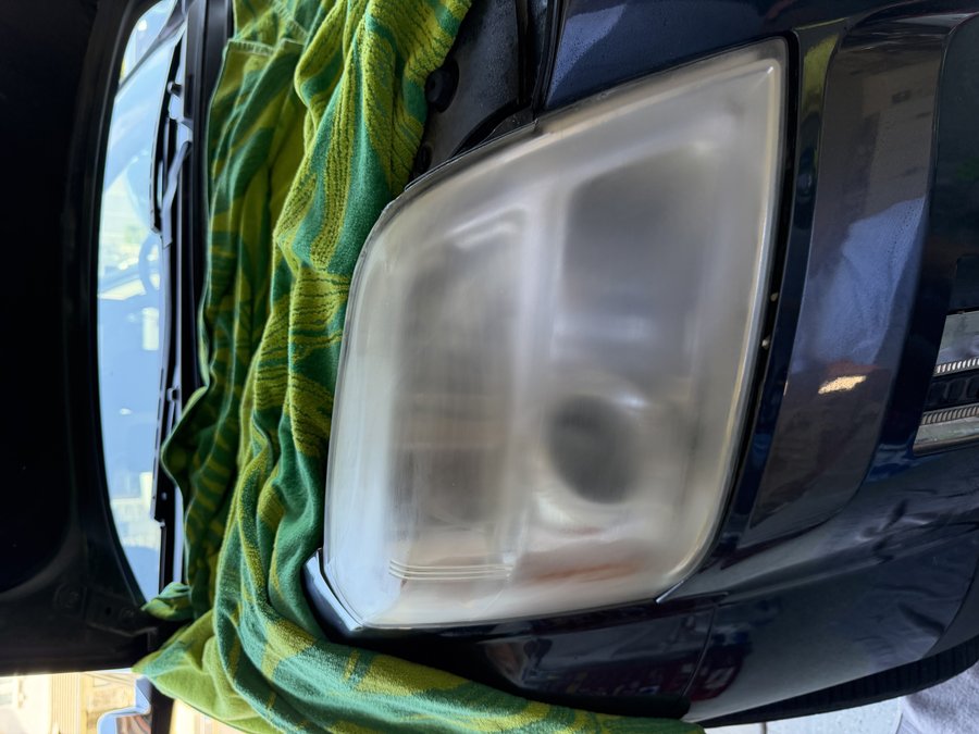 Cloudy, oxidized headlight before restoration